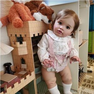 24 inch reborn baby girl with outfits and accessories